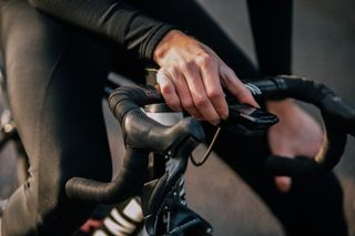 Image shows cyclist starting his head unit