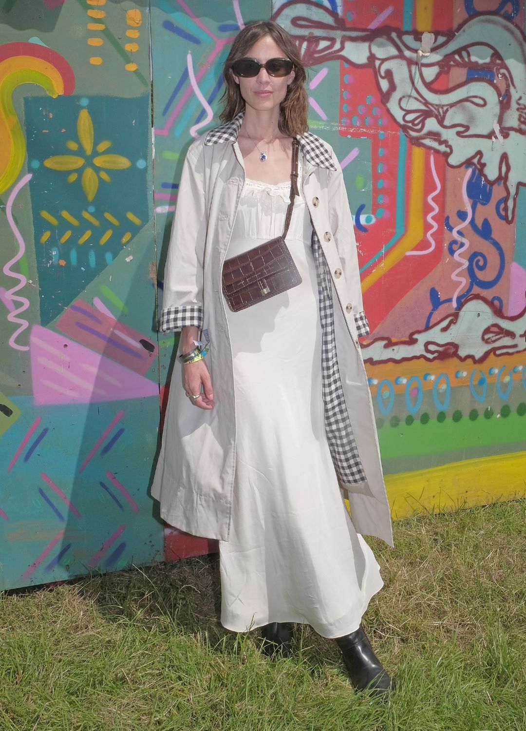 Alexa Chung is seen on day one of the festival wearing her vintage Barbour jacket on June 24, 2022 in Glastonbury, England