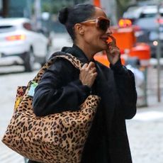 Tracee Ellis Ross was spotted in rare Asics sneakers and a leopard-print tote bag