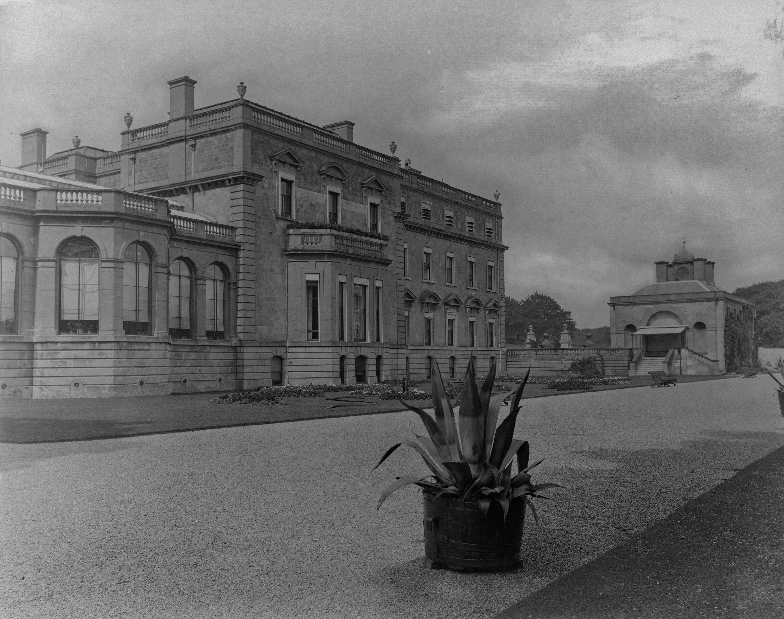 Black-and-white photographs of a neo-Palladian manor house