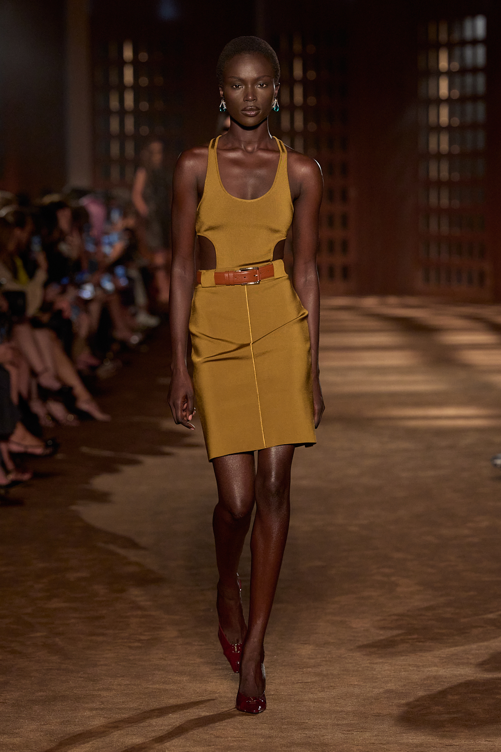 a model walks the ferragamo spring 2027 runway.