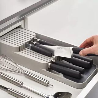 A grey in drawer knife organzier