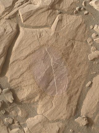 This close-up photo of Mars taken by NASA's Curiosity rover shows a target called "Christmas Cove" on Sept. 16, 2017. Curiosity used its Dust Removal Tool to brush an area 2.5 inches (6 cm) across.