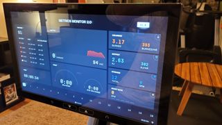 A photo of the metrics monitor on the Aviron Impact Series Rower