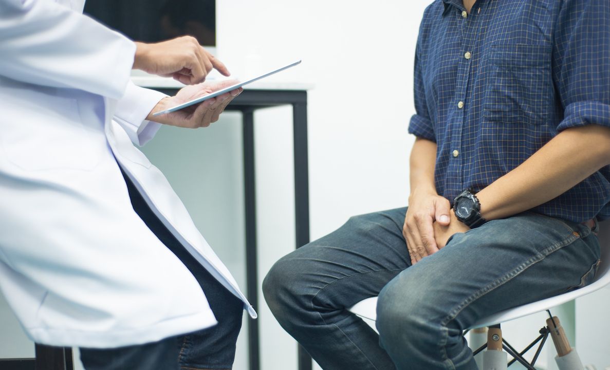 A patient meeting with his doctor.