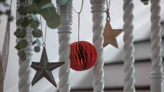 how to style a hallway with baubles and hanging decorations