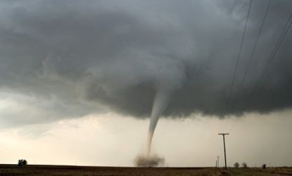A tornado in Kansas is captured on film: More than 600 twisters were reported this April alone, the nation's deadliest tornado outbreak in 86 years.
