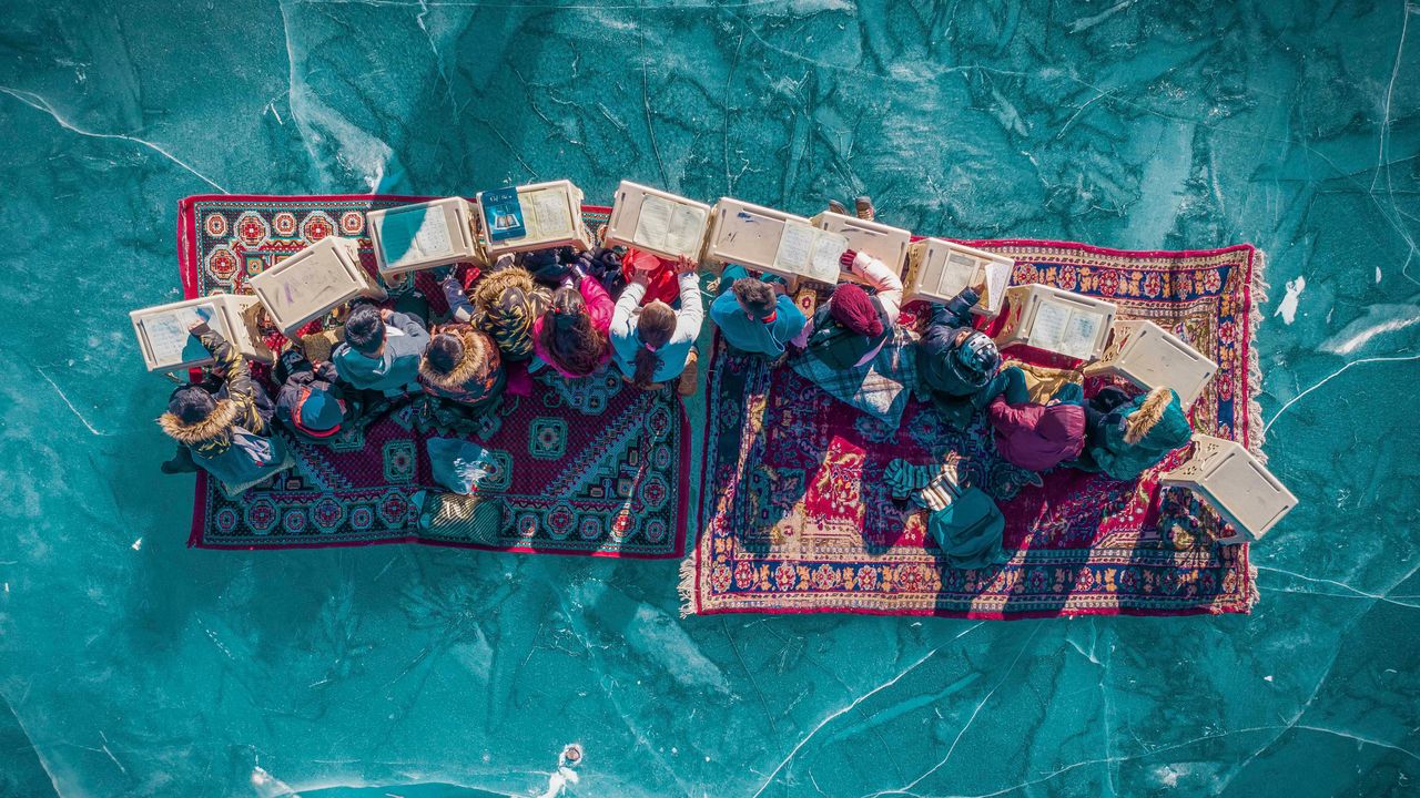 Incredible image of children studying on a frozen lake among the best photos and videos so far in DJI and SkyPixel's $200,000 drone contest