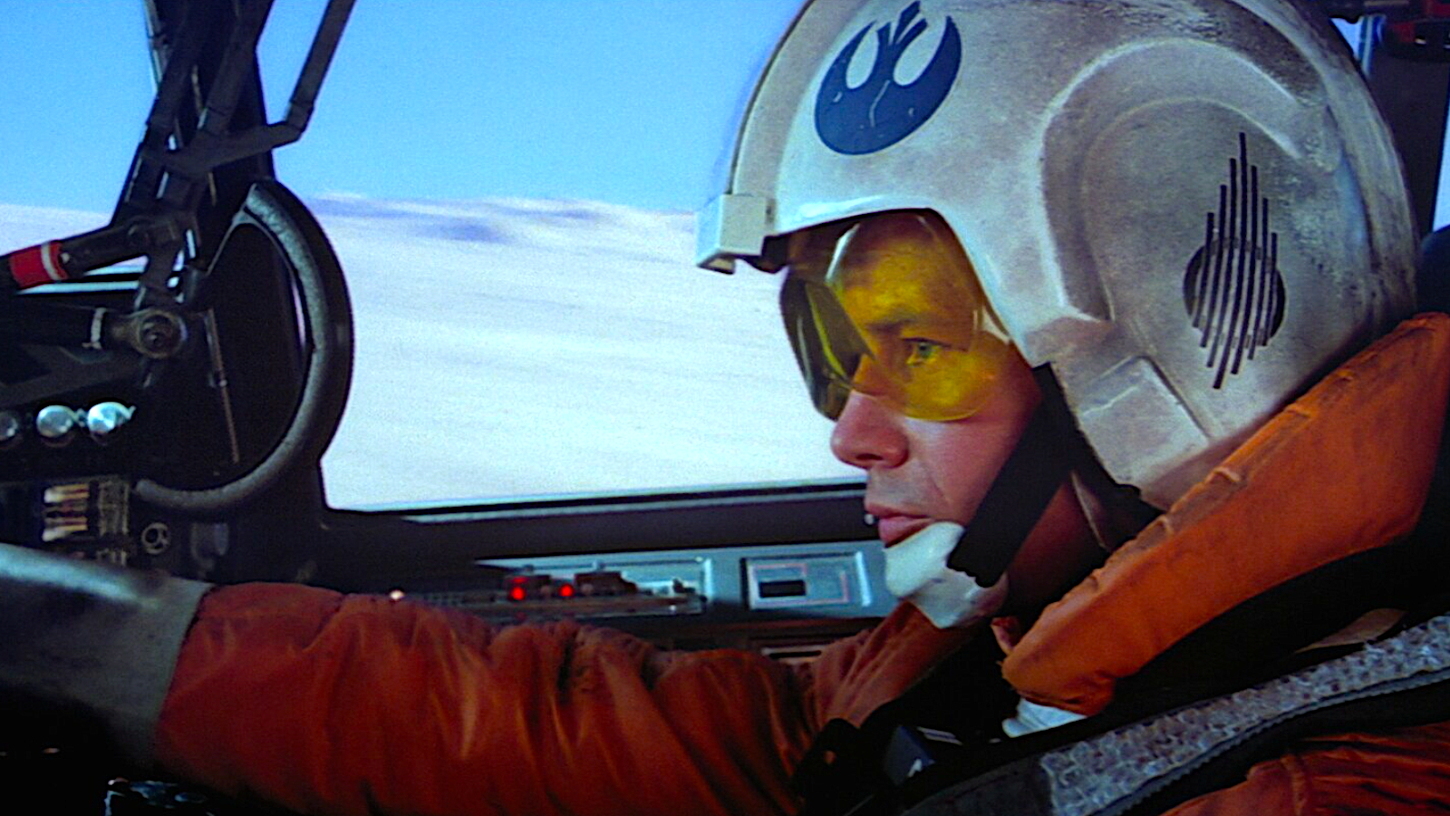 a rebel space pilot in a starfighter with a snowy backdrop