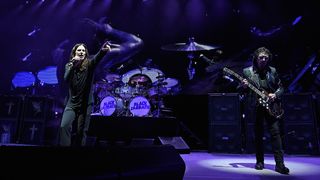 (L-R) Ozzy Osbourne, Tommy Clufetos, and Tony Iommi perform onstage as Black Sabbath on "The End Tour" at Nikon at Jones Beach Theater on August 17, 2016 in Wantagh, New York