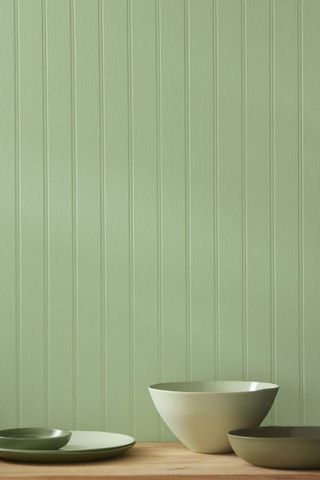 Benjamin Moore Seedling paint on a panelled wall