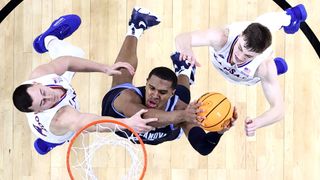 Eric Dixon #43 of the Villanova Wildcats shoots against the Kansas Jayhawks in the second half of the game during the 2022 NCAA Men's Basketball Tournament Final Four semifinal at Caesars Superdome on April 02, 2022 in New Orleans, Louisiana.
