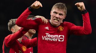 MANCHESTER, ENGLAND - DECEMBER 26: Rasmus Hojlund of Manchester United celebrates scoring the third and winning goal during the Premier League match between Manchester United and Aston Villa at Old Trafford on December 26, 2023 in Manchester, England. (Photo by Visionhaus/Getty Images)