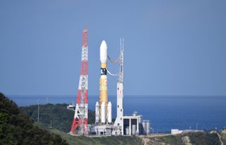 A Mitsubishi Heavy Industries-built H-IIB rocket carrying the HTV-8 cargo ship for the Japan Aerospace Exploration Agency stands atop its launchpad at Tanegashima Space Center for a Sept. 24, 2019 launch.