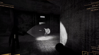 A snail man walking around a dark room