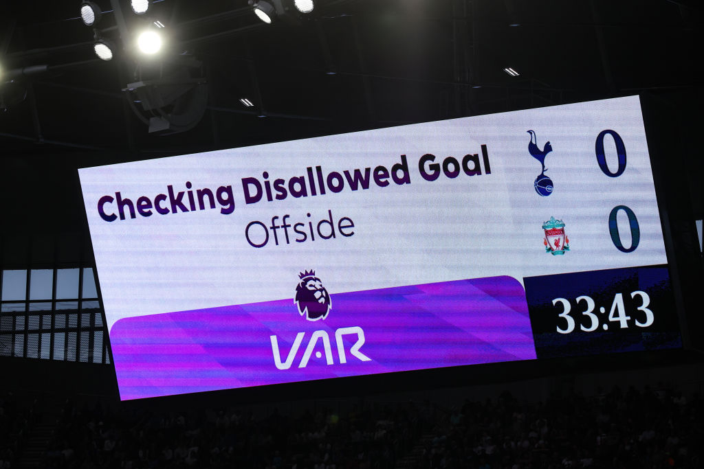 The LED board shows the decision to award Curtis Jones of Liverpool (not pictured) a red card during the Premier League match between Tottenham Hotspur and Liverpool FC at Tottenham Hotspur Stadium on September 30, 2023 in London, England