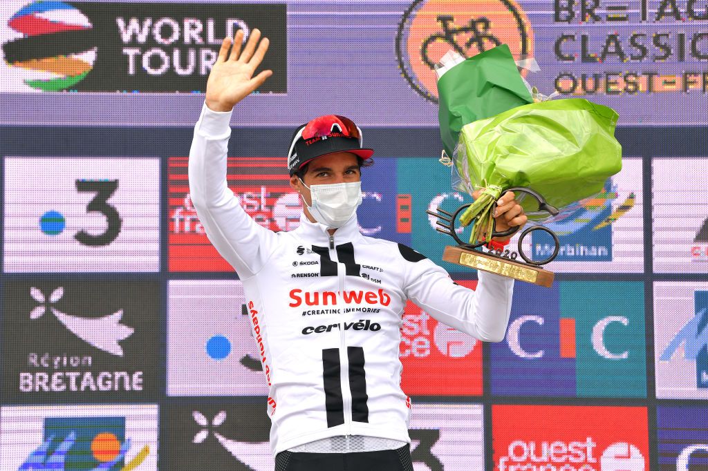 PLOUAY FRANCE AUGUST 25 Podium Michael Matthews of Australia and Team Sunweb Celebration Mask Trophy Flowers Covid safety measures during the 84th Bretagne Classic OuestFrance 2020 a 2478km race from Plouay to Plouay GrandPrixPlouay GPPlouay on August 25 2020 in Plouay France Photo by Luc ClaessenGetty Images