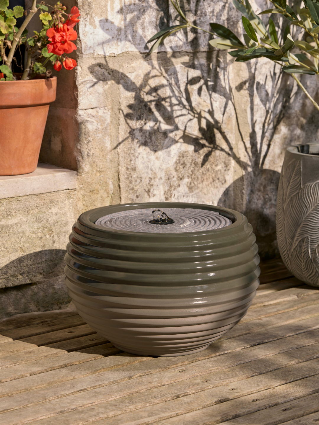 A ribbed green water feature from Cox &amp;amp; Cox