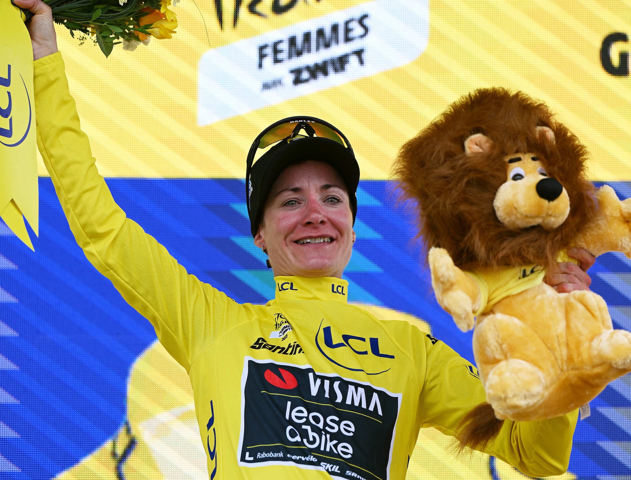 POITIERS, FRANCE - JULY 29: Marianne Vos of Netherlands and Team Visma | Lease a Bike celebrates at podium as Yellow Leader Jersey winner during the 4th Tour de France Femmes 2025, Stage 4 a 130.7km stage from Saumur to Poitiers / #UCIWWT / on July 29, 2025 in Poitiers, France. (Photo by Tim de Waele/Getty Images)