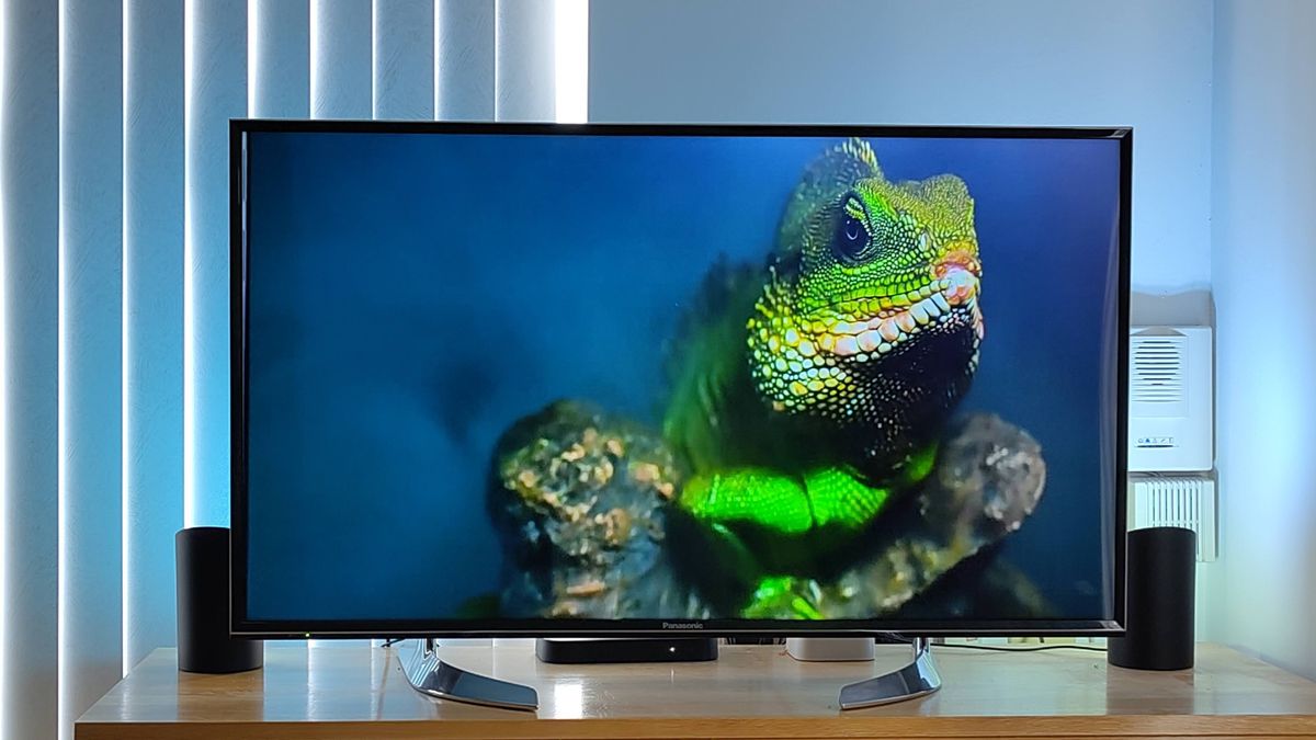 Two Philips Hue Play Wall Washer lights beside TV