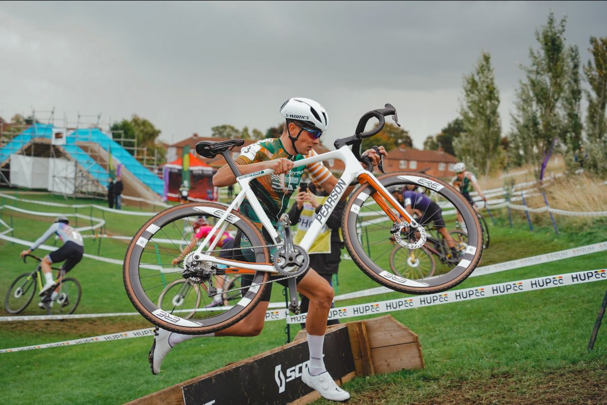 Man runs with bike carried