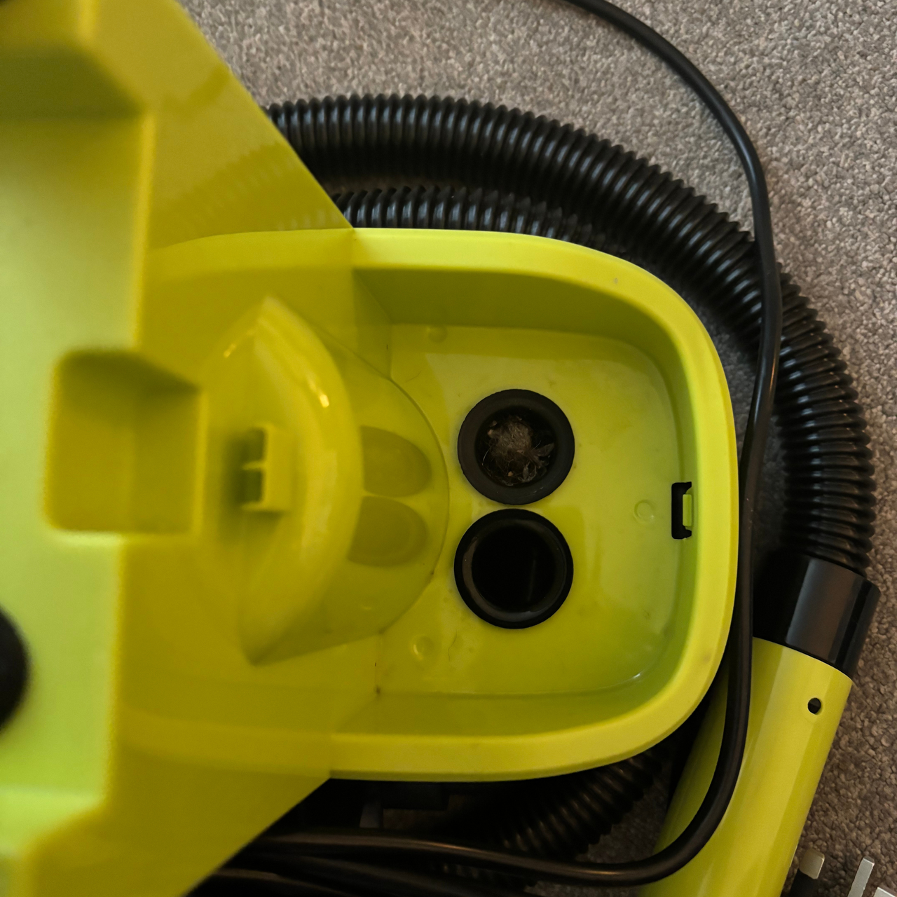 Base of Gtech Koala Spot Cleaner water tank with two rubber round filter holes
