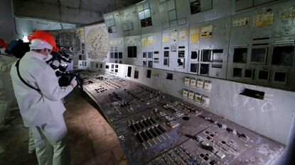On Sept. 15, a group of journalists visited the control room of the Chernobyl nuclear power plant's reactor 4. 