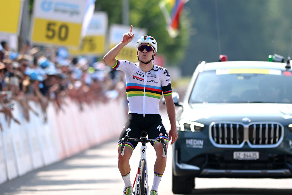 WEINFELDEN SWITZERLAND JUNE 17 Remco Evenepoel of Belgium and Team Soudal QuickStep celebrates at finish line as stage winner and dedicates the victory to Gino Mder during the 86th Tour de Suisse 2023 Stage 7 a 1835km stage from Tbach to Weinfelden UCIWT on June 17 2023 in Weinfelden Switzerland Photo by Dario BelingheriGetty Images