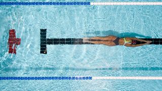 Woman swimming in pool