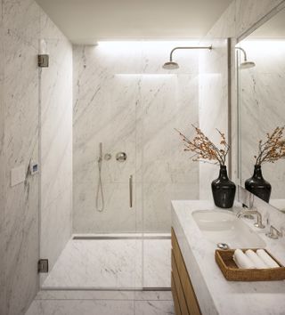 sleek marble bathroom at new york apartment