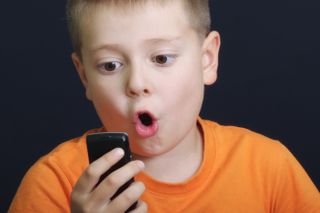 child with mobile phone