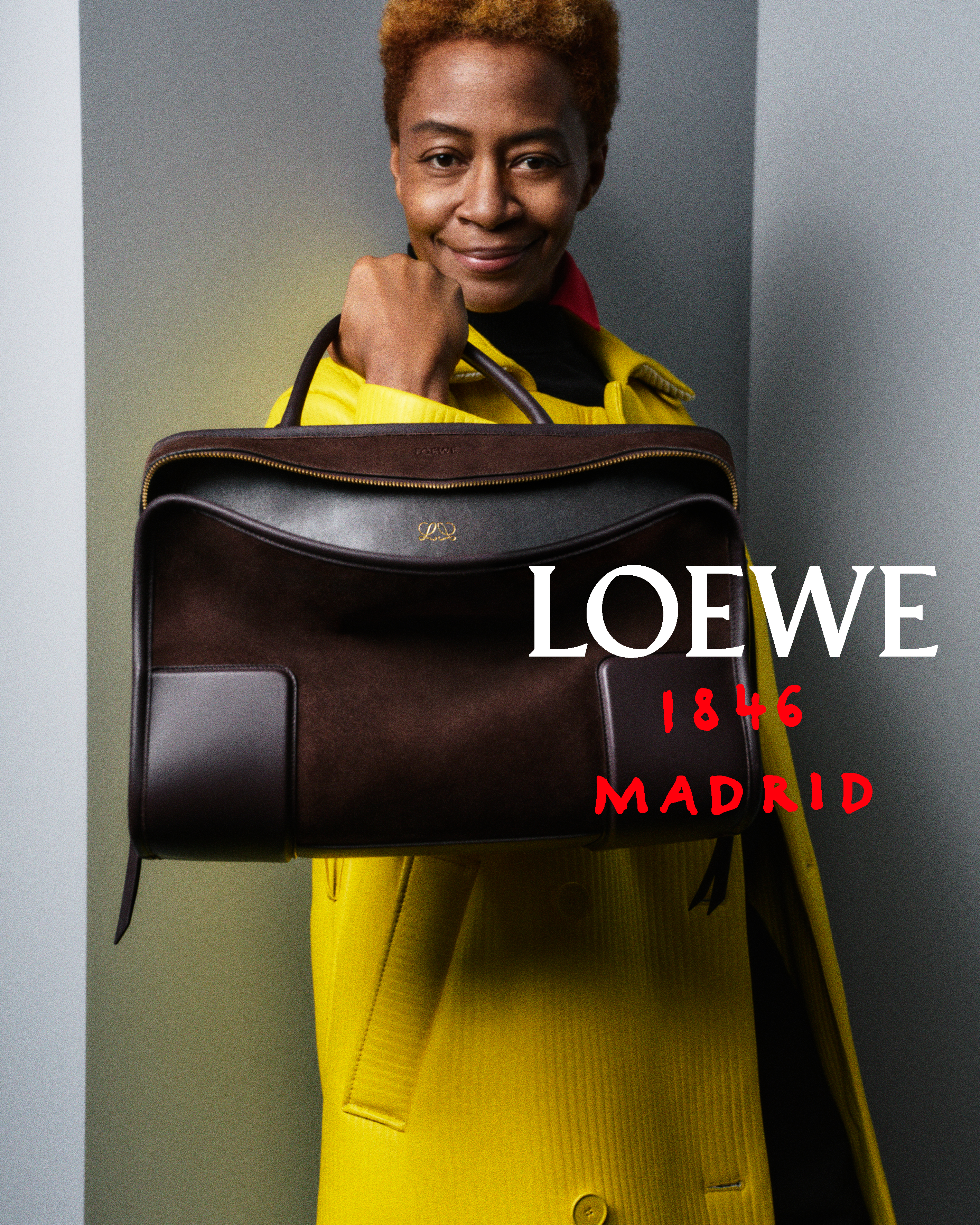 Kara Walker wears the brown Amazona bag.