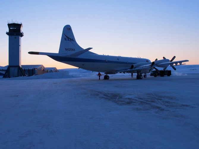 Dawn over the P-3B and the Thule airport tower. 