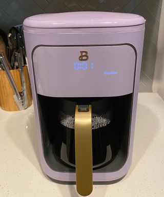 A pot of coffee made using the Beautiful by Drew Barrymore coffee maker