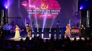 Guitarists rock out on stage at La Croix Church,