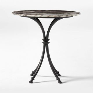 A marble top CB2 bistro table for the best outdoor furniture brands.