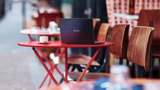 Lenovo Yoga Solar PC on a table outside of a cafe