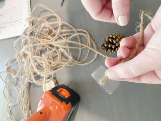 Using string to make a fall garland for the mantel