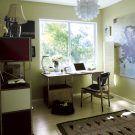 home office room with laptop and rug