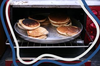 Pancakes slightly burnt being cooked in an oven
