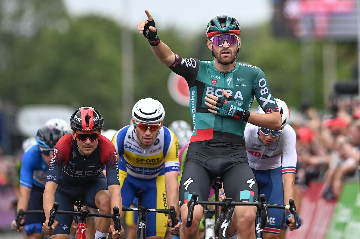 Picture by Will Palmer/SWpix.com - 08/09/2022 - Cycling - 2022 AJ Bell Tour of Britain - Stage 5: West Bridgeford to Mansfield, England - Jordi Meeus of Team BORA Hansgrohe sprinting to victory with Stanislaw Aniolkowski of Team Bingoal Pauwels Sauces WB in second and Tom Pidcock of team INEOS Grenadier in third