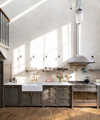 Dark grey kitchen in large open plan space