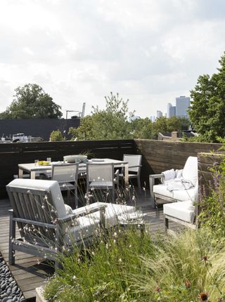 deck with lounge and dining furniture