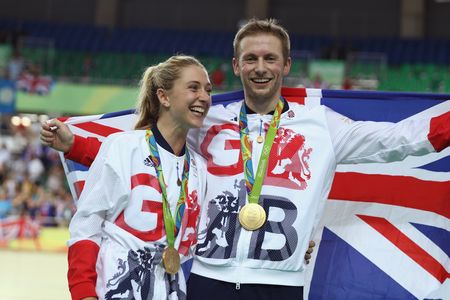 Laura Trott and Jason Kenny with their gold medals
