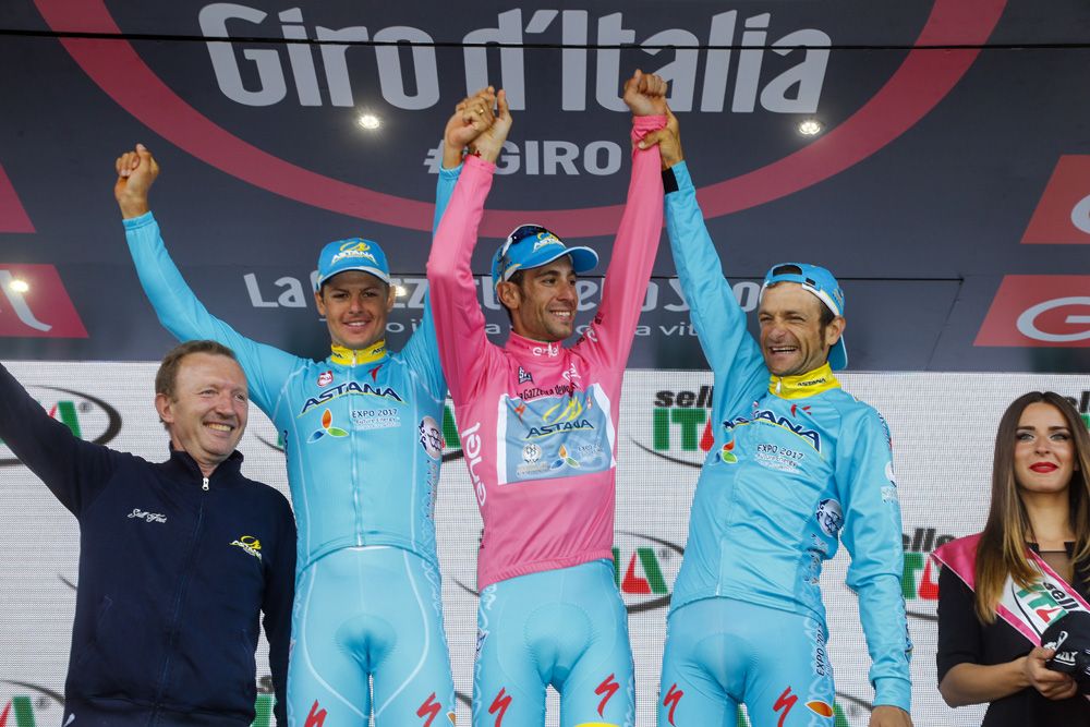 Michele Scarponi celebrates success at the 2016 Giro d'Italia with Vincenzo Nibali