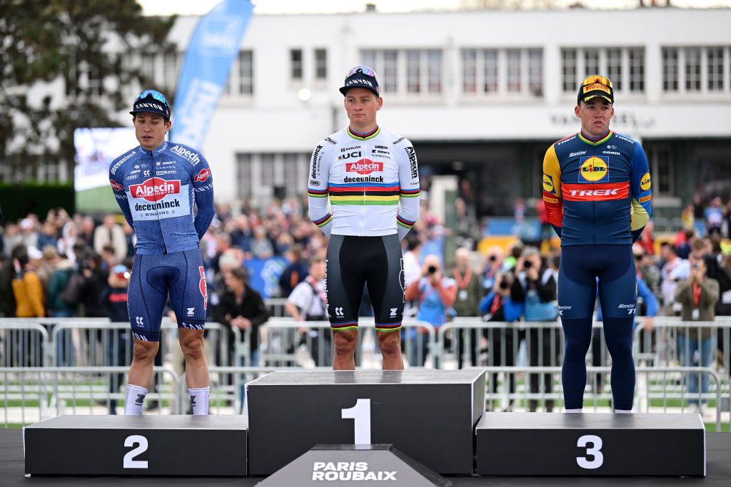 ROUBAIX FRANCE APRIL 07 LR Jasper Philipsen of Belgium and Team Alpecin Deceuninck on second place race winner Mathieu van der Poel of The Netherlands and Team Alpecin Deceuninck and Mads Pedersen of Denmark and Team Lidl Trek on third place pose on the podium ceremony after the 121st ParisRoubaix 2024 a 2597km one day race from Compiegne to Roubaix UCIWT Roubaix Velodrome Velodrome Andre Petrieux on April 07 2024 in Roubaix France Photo by Dario BelingheriGetty Images