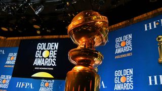 Golden Globes statuette on stage