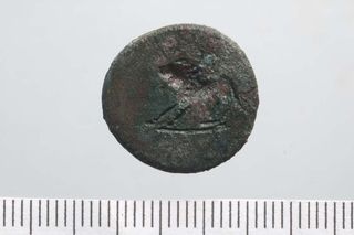 The graffiti lion incised on this coin is likely a symbol of the goddess Cybele, often associated with mountains.