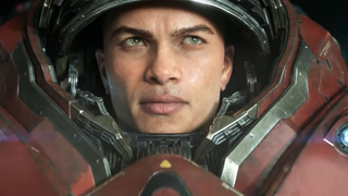 Screenshot from StarCraft (2030), showing a man standing inside of a red mech suit.