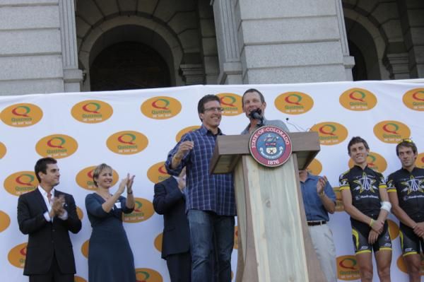 Legendary American pro and Colorado native, Davis Phinney (l), joins Lance Armstrong at the podium.